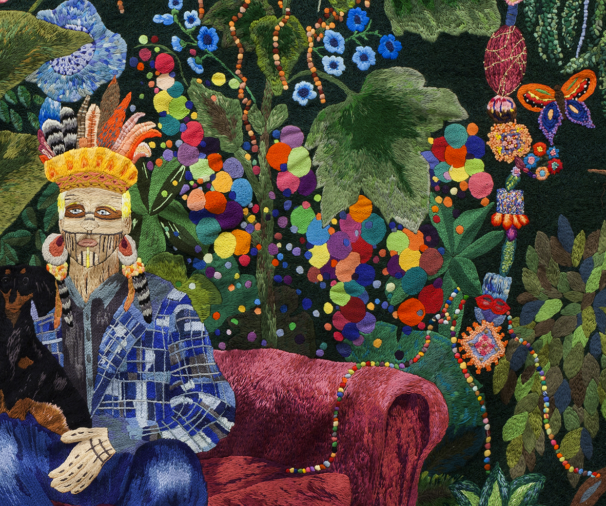 a colorful tapestry with a man holding a cat